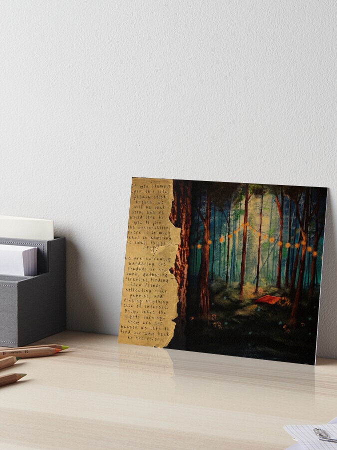 Mixed-media painting of a dark, magical forest with a small campsite illuminated by a string of warm glowing lights, situated directly beside a torn piece of paper featuring handwritten poetry